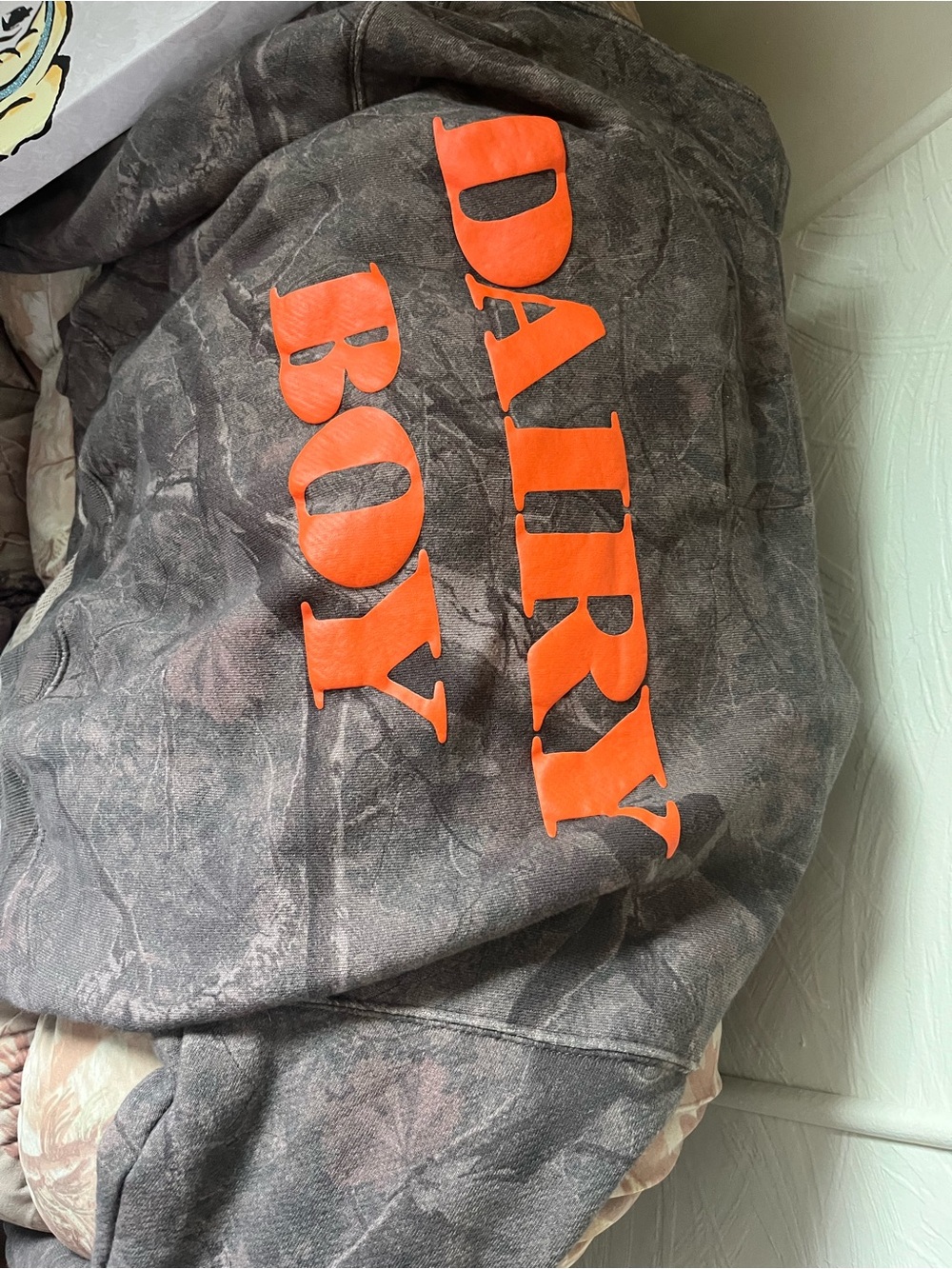 DAIRY BOY River camo hoodie with orange logo